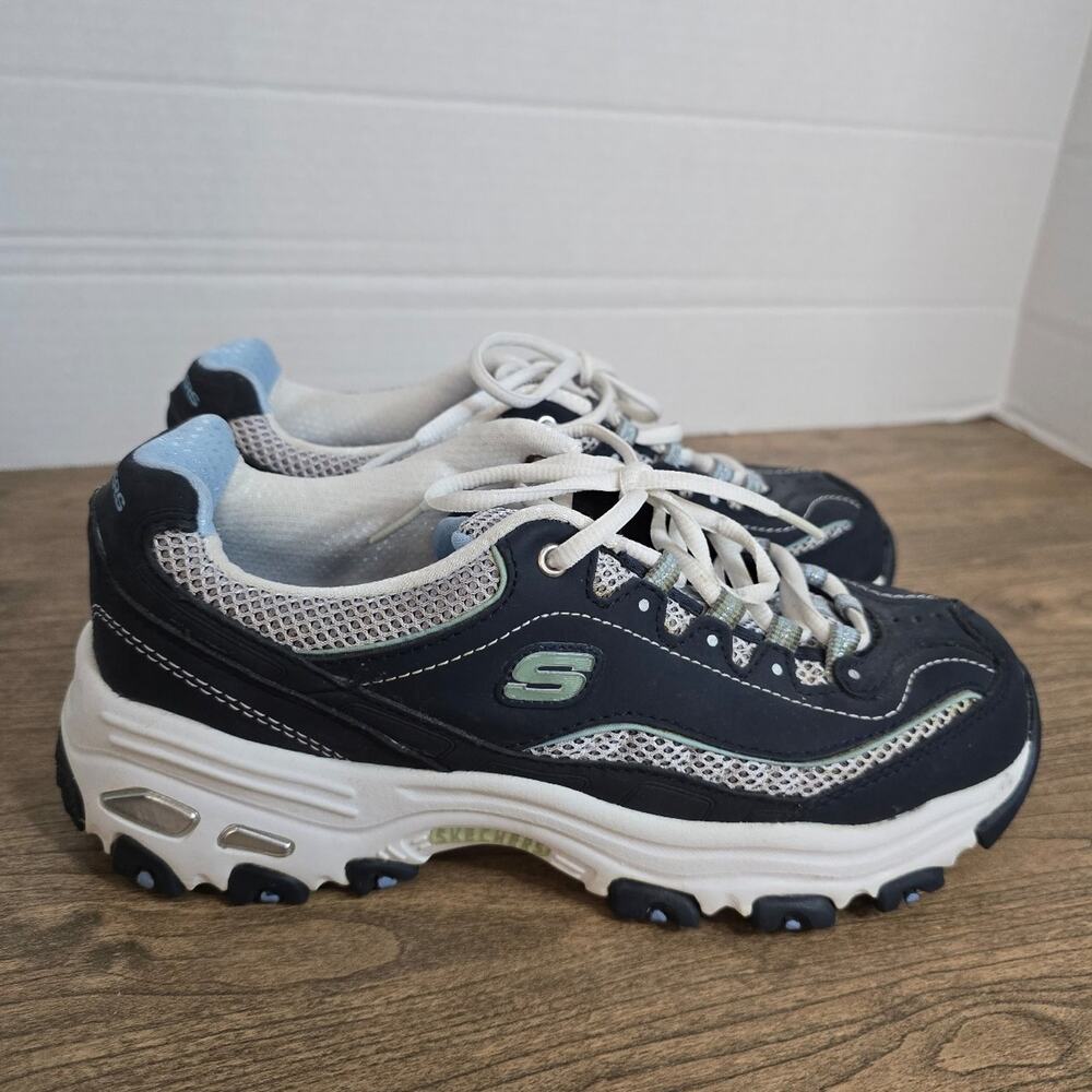 Skechers D'Lites Life Saver navy blue and white sneakers featuring a memory foam